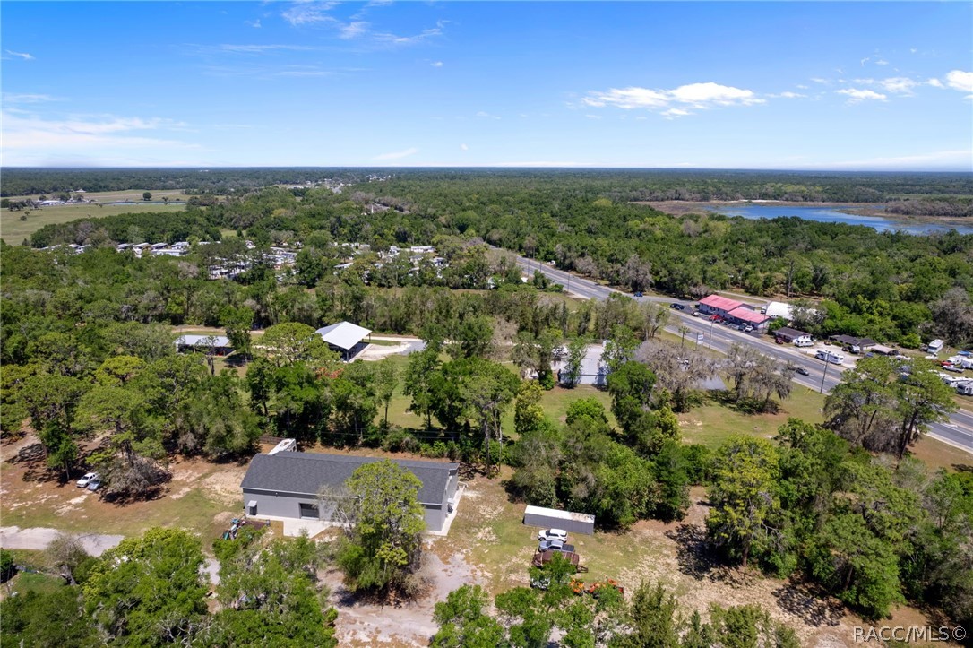 4530 South Florida Avenue Inverness, FL 34450 - Photo 95 of 100 an aerial view of residential houses with outdoor space and trees