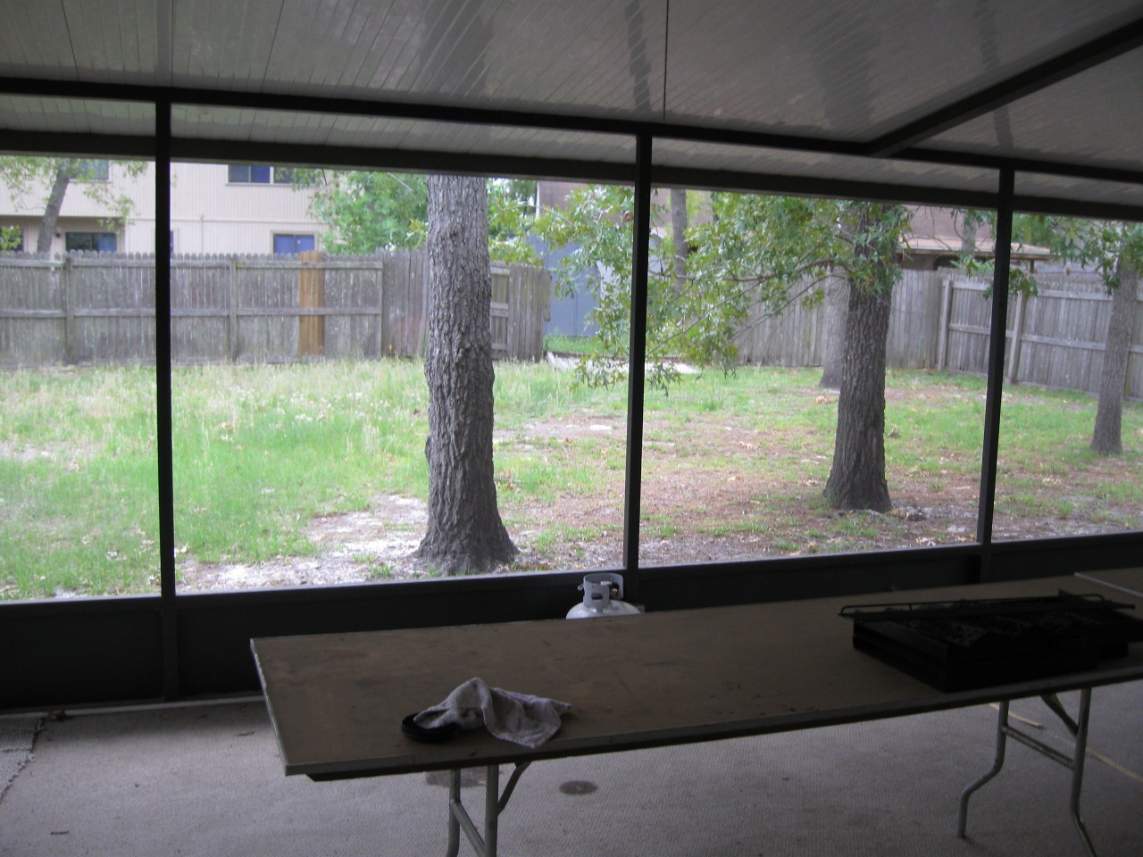 8340 Chason Road East Jacksonville, FL 32244 - Photo 17 of 17 Screened Lanai Looking into Backyard