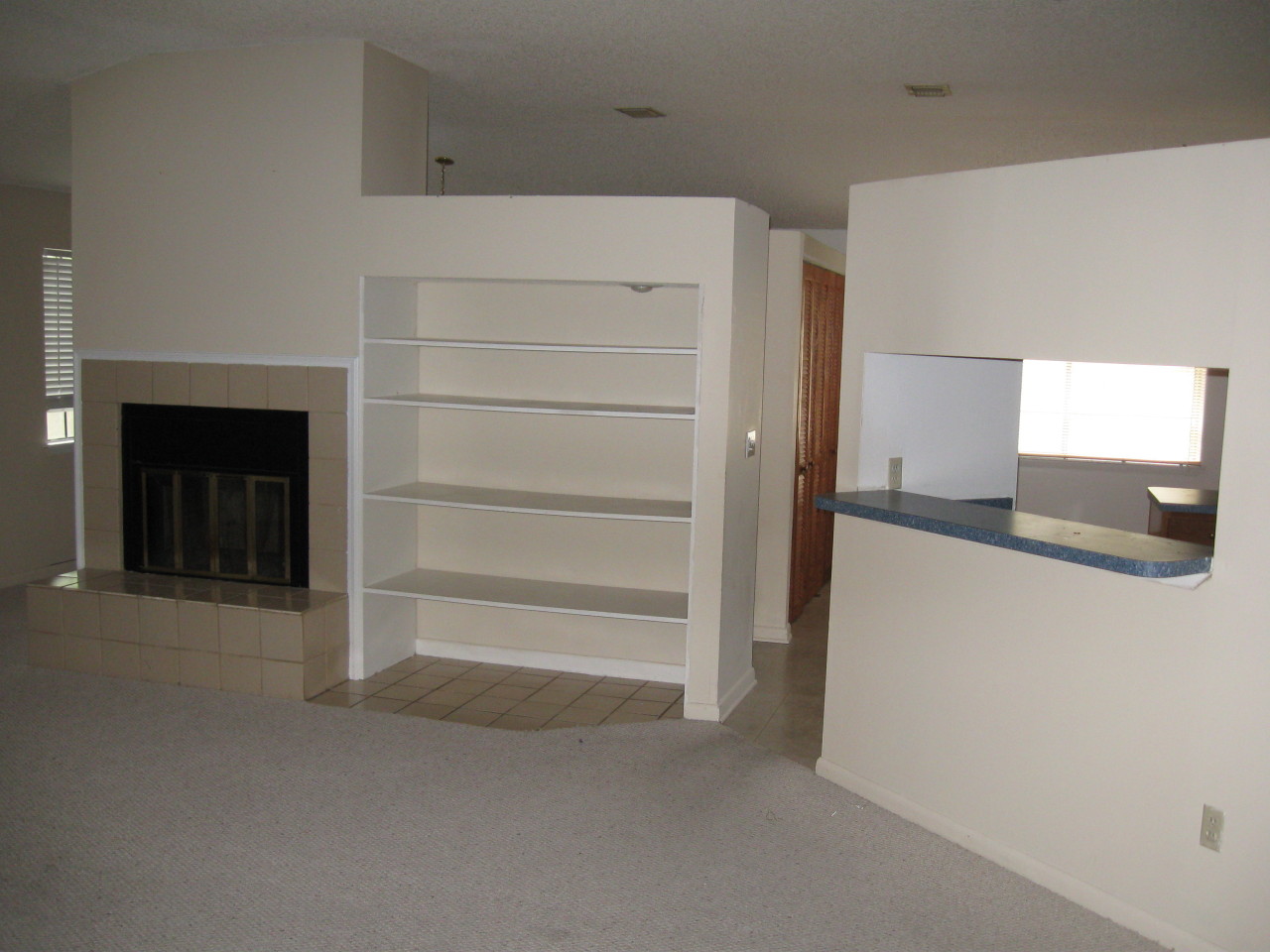 8340 Chason Road East Jacksonville, FL 32244 - Photo 7 of 17 Fireplace - Entry to Kitchen
