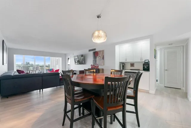 a view of a dining room with furniture