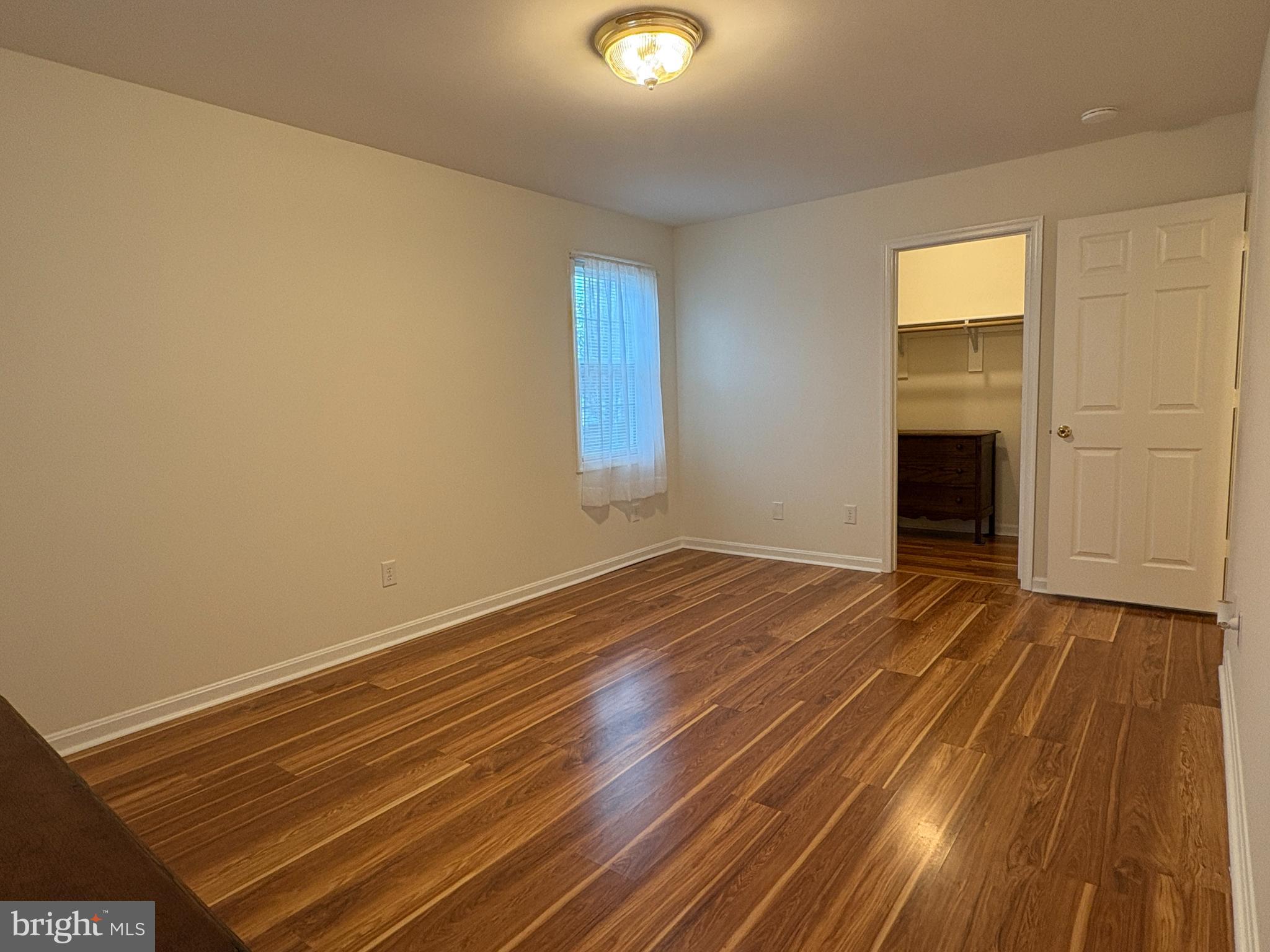 180 King Street Culpeper, VA 22701 - Photo 12 of 22 wooden floor in an empty room