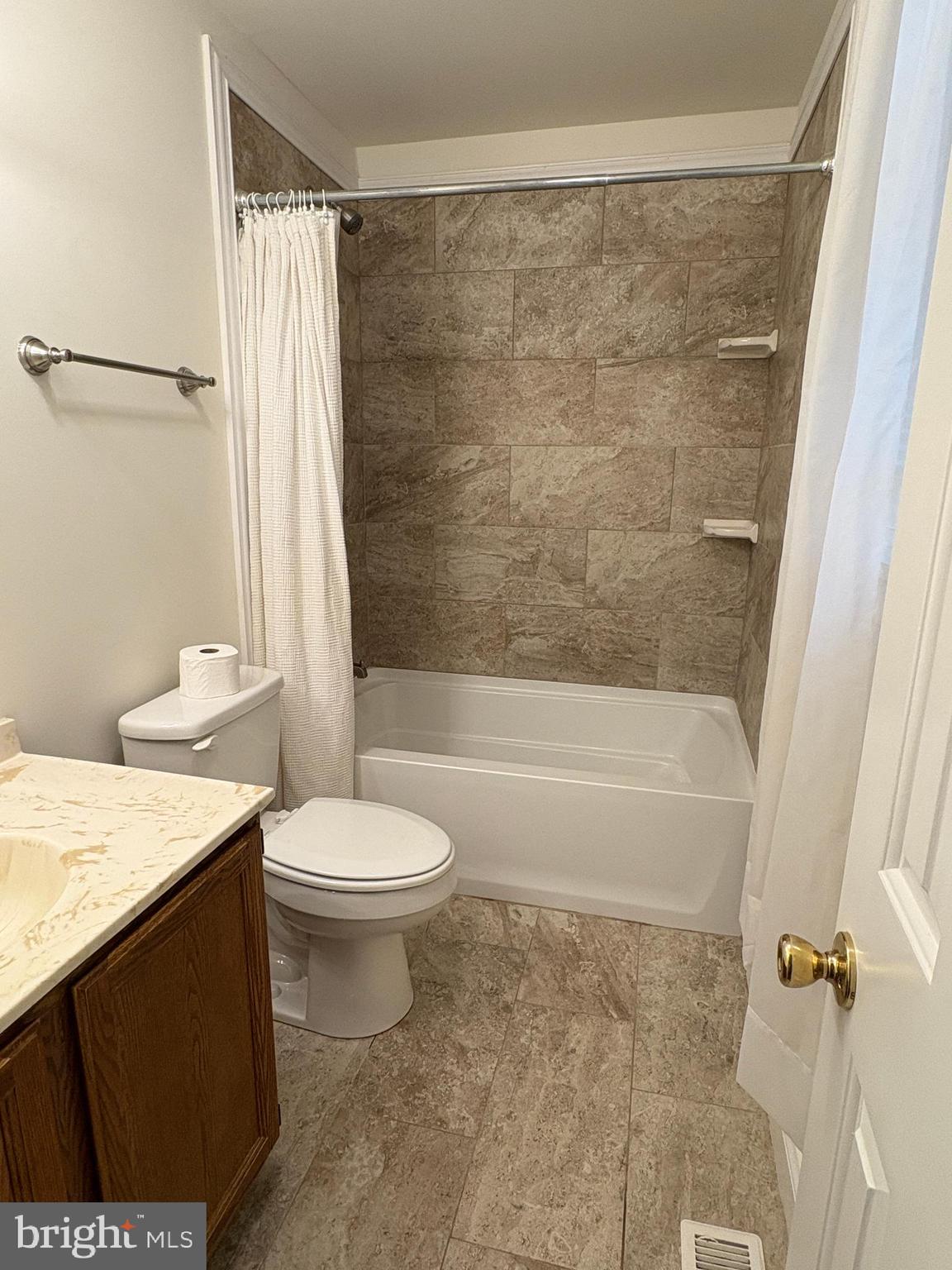 180 King Street Culpeper, VA 22701 - Photo 15 of 22 a bathroom with a sink a toilet and shower
