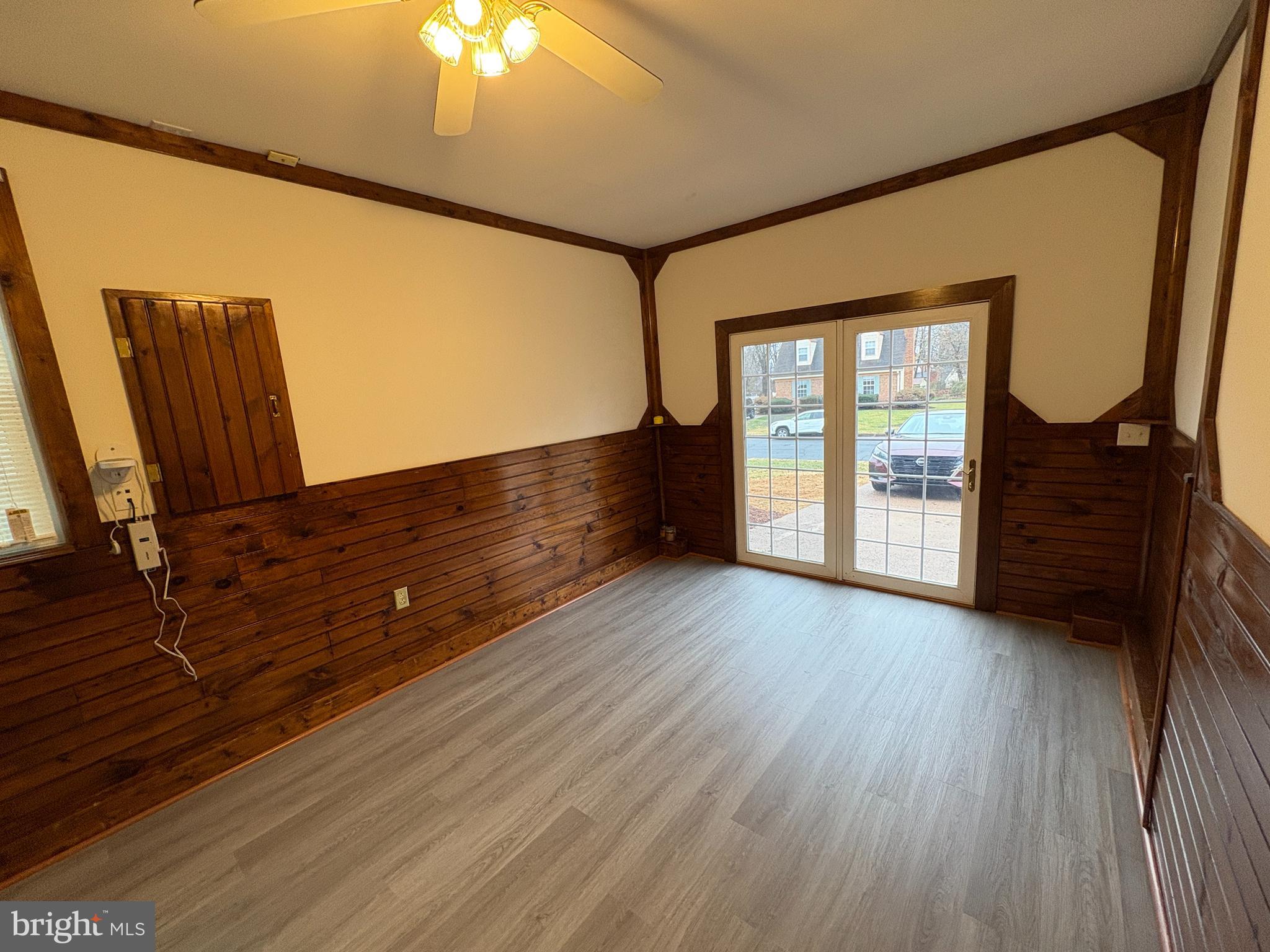 180 King Street Culpeper, VA 22701 - Photo 18 of 22 wooden floor in an empty room with a window