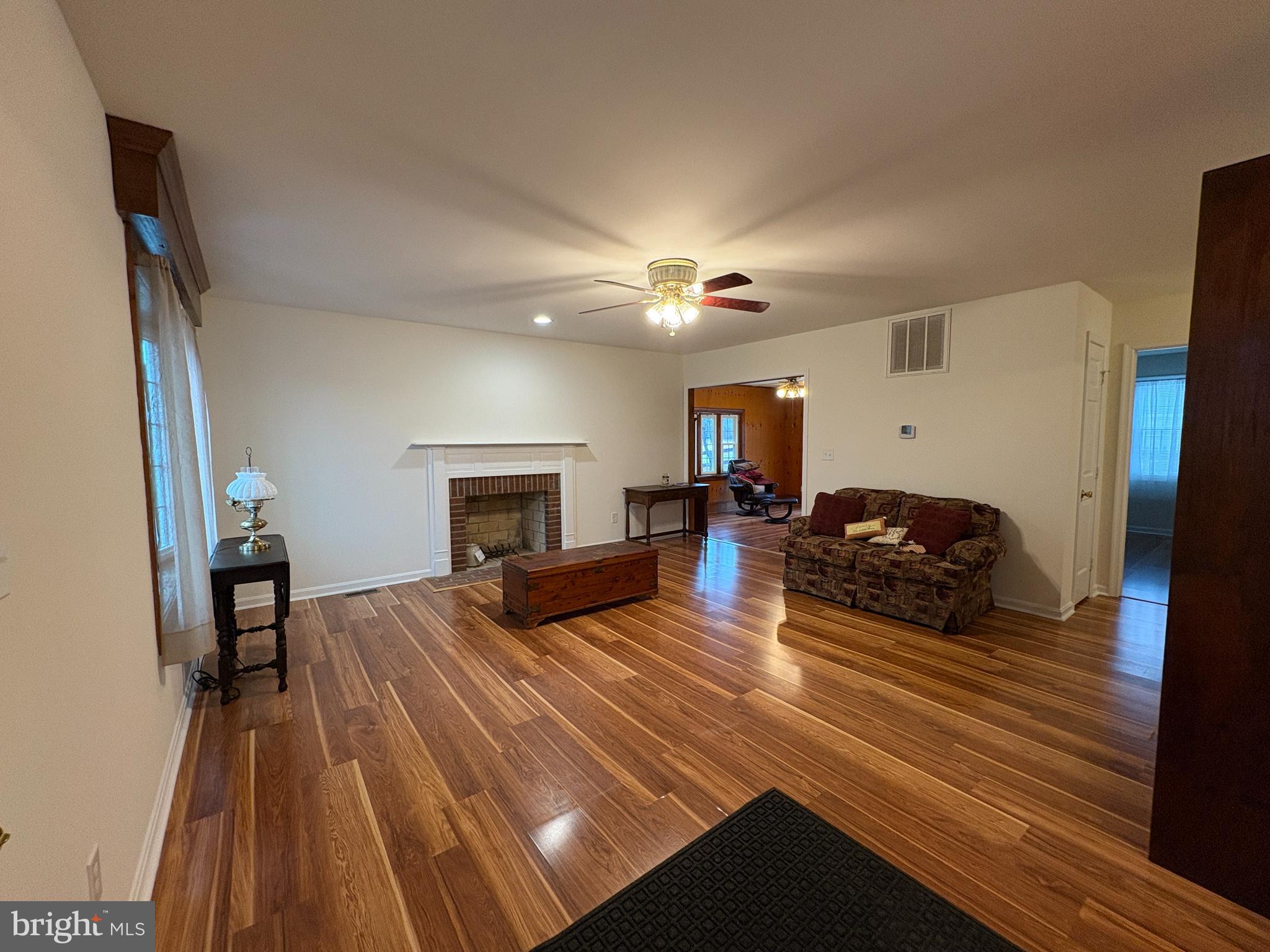 180 King Street Culpeper, VA 22701 - Photo 2 of 22 a living room with furniture and a fireplace