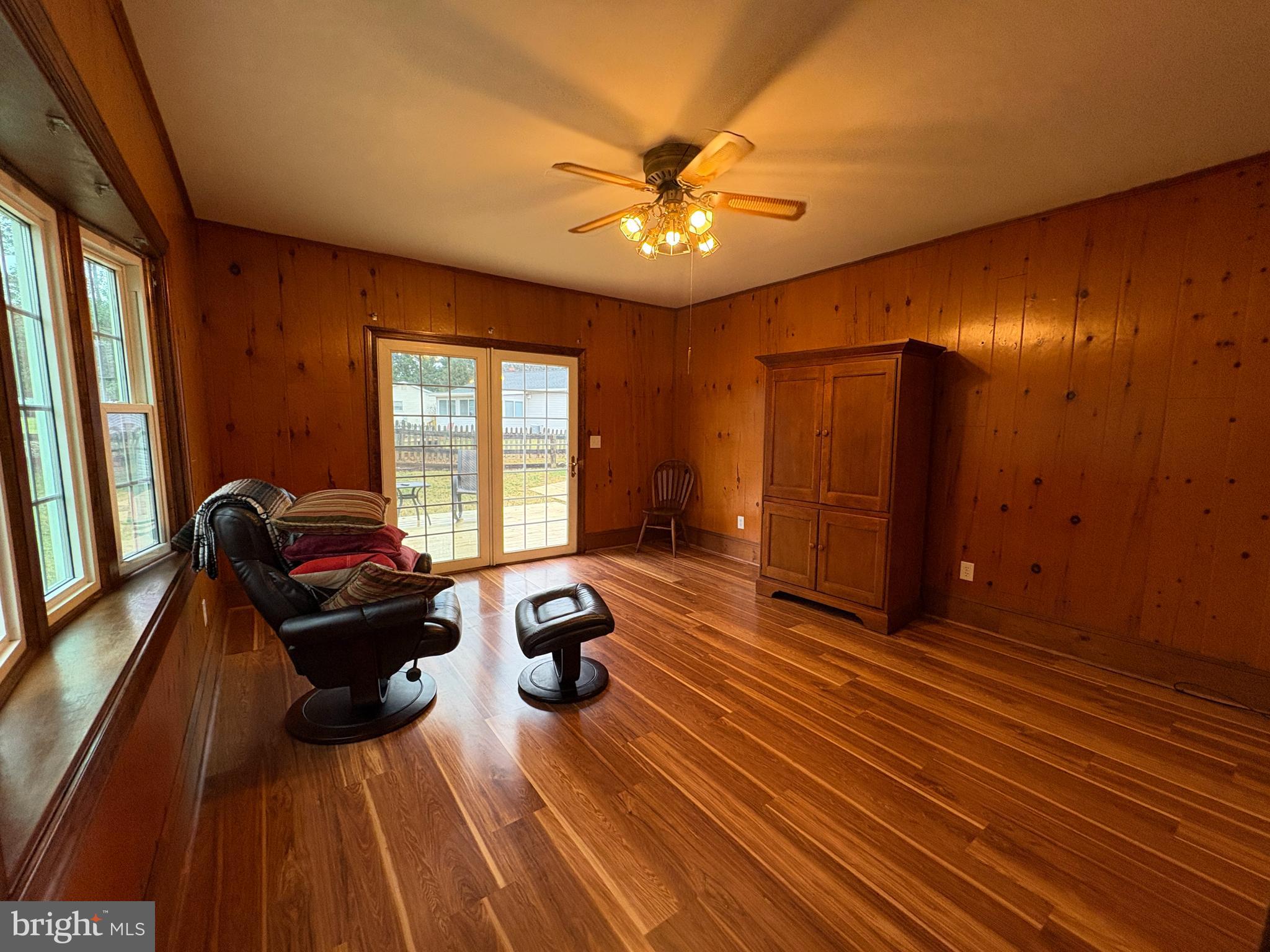 180 King Street Culpeper, VA 22701 - Photo 4 of 22 a living room with furniture and a chandelier