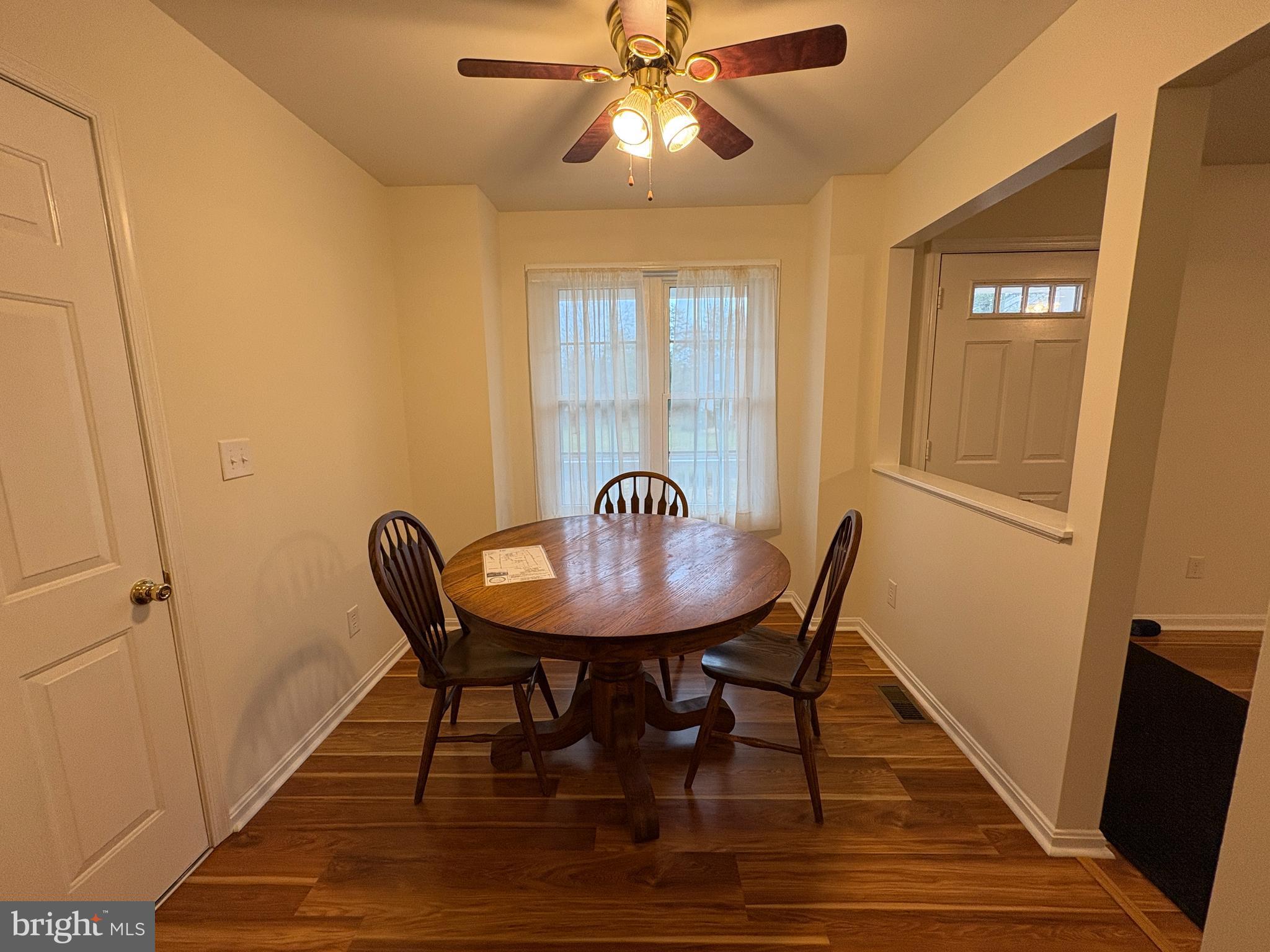 180 King Street Culpeper, VA 22701 - Photo 8 of 22 a view of a dining room with furniture and wooden floor