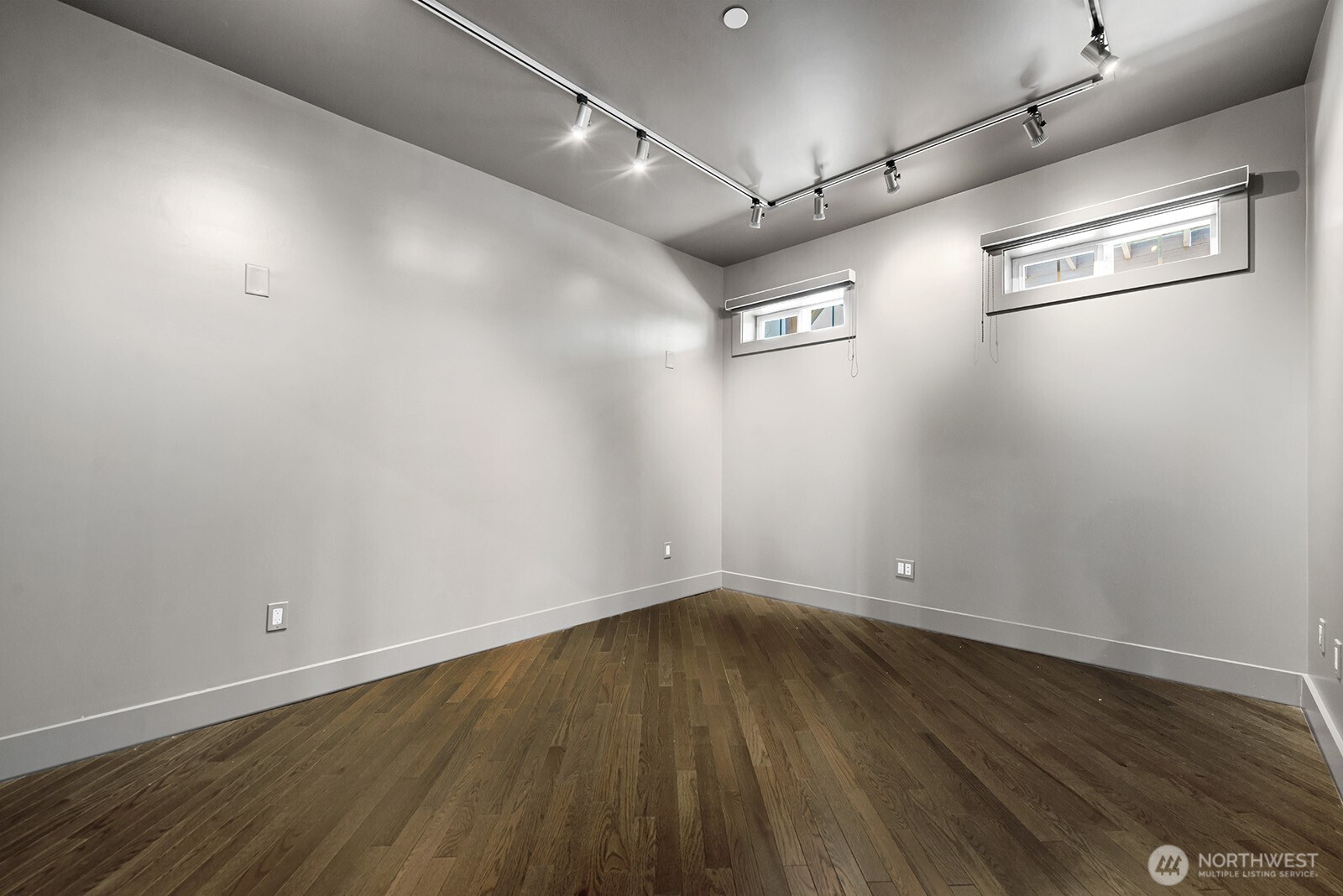 745 Bellevue Avenue East, Unit 402 Seattle, WA 98102 - Photo 23 of 39 a view of a room with wooden floor