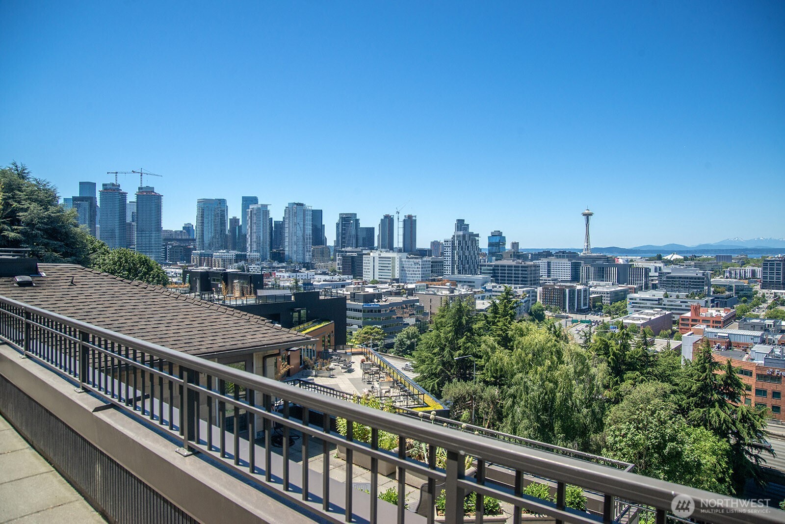 745 Bellevue Avenue East, Unit 402 Seattle, WA 98102 - Photo 3 of 39 a view of a city from a balcony