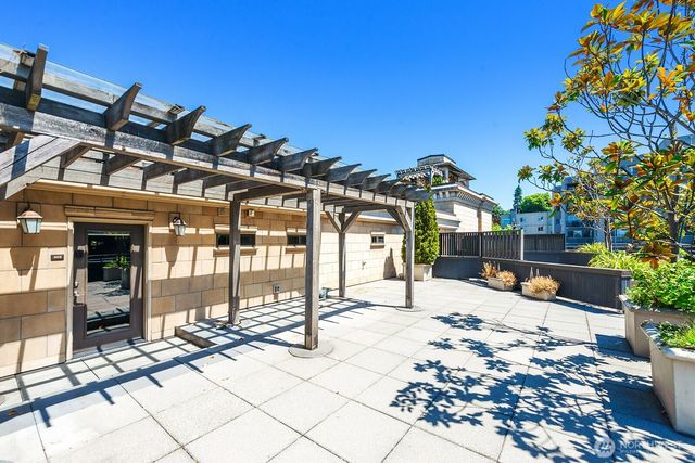 a view of a chairs and tables in the patio