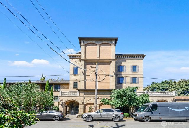 a car parked in front of a building