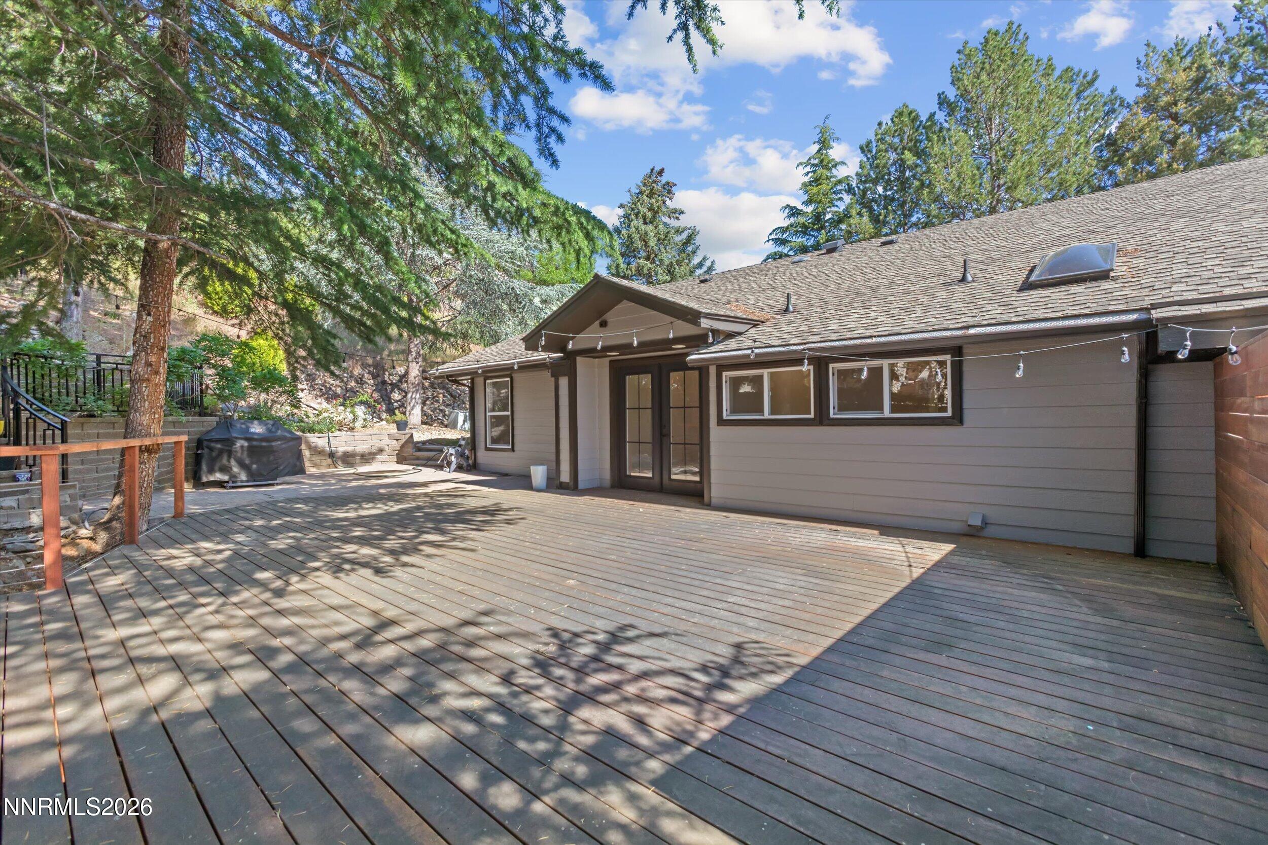 2725 West Lake Ridge Shores Reno, NV 89519 - Photo 45 of 49 a front view of a house with a garden