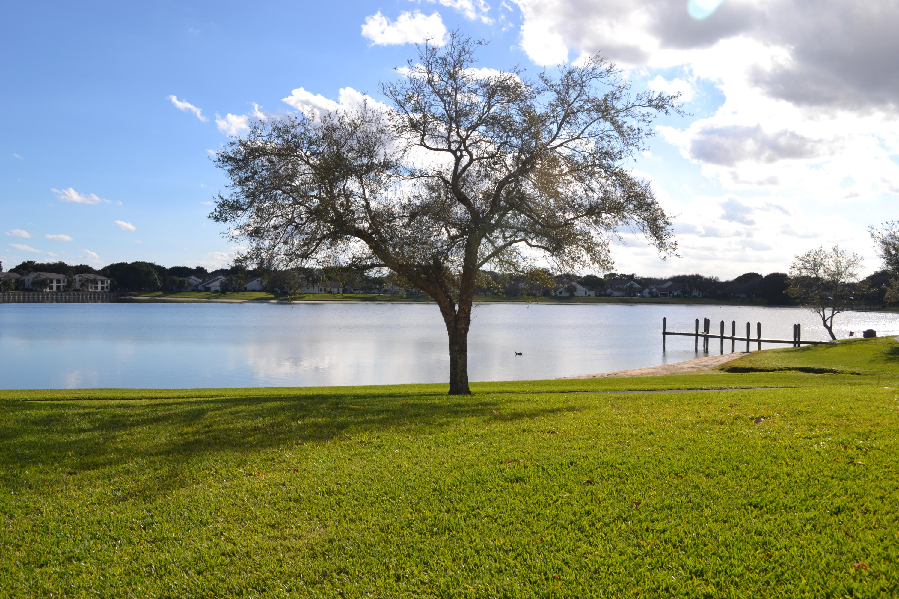 321 Norwood Terrace, Unit N220 Boca Raton, FL 33431 - Photo 2 of 24 Front Patio Lake View