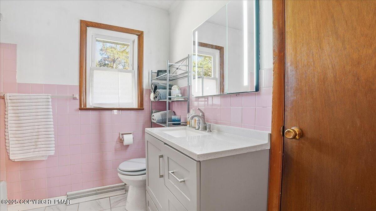 612 Prices Drive Cresco, PA 18326 - Photo 21 of 37 a bathroom with a sink toilet and mirror