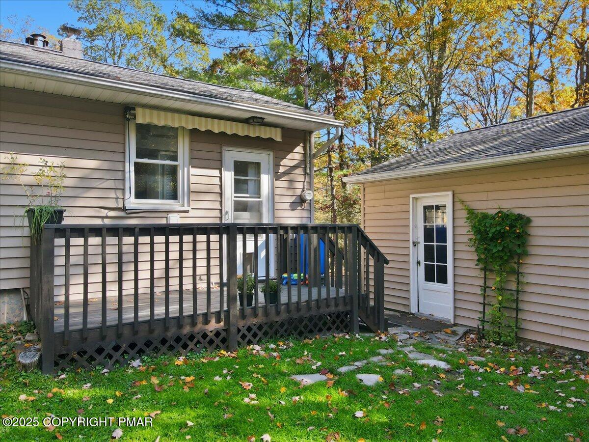 612 Prices Drive Cresco, PA 18326 - Photo 25 of 37 a front view of a house with a small yard