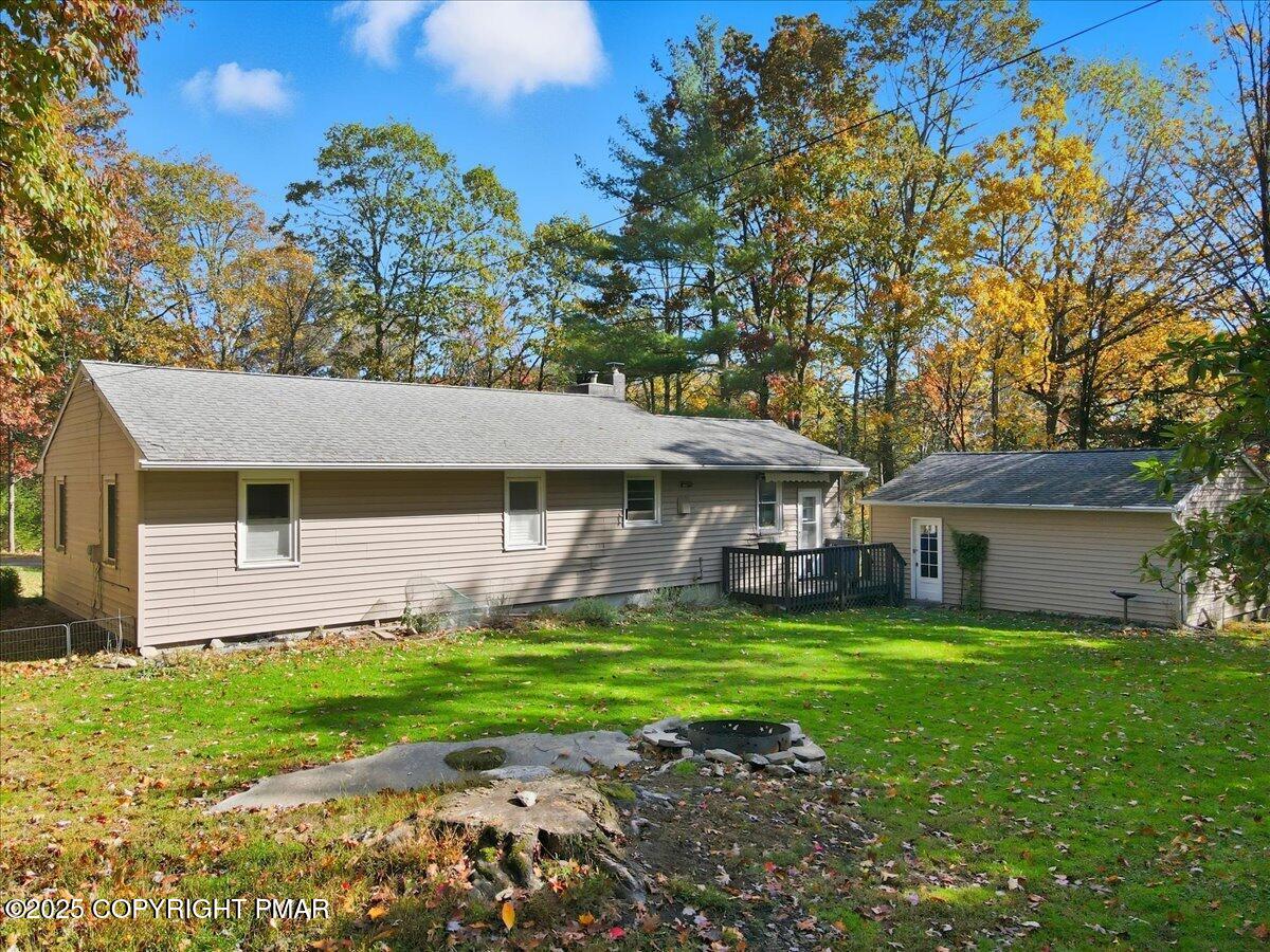 612 Prices Drive Cresco, PA 18326 - Photo 27 of 37 a view of a house with a yard