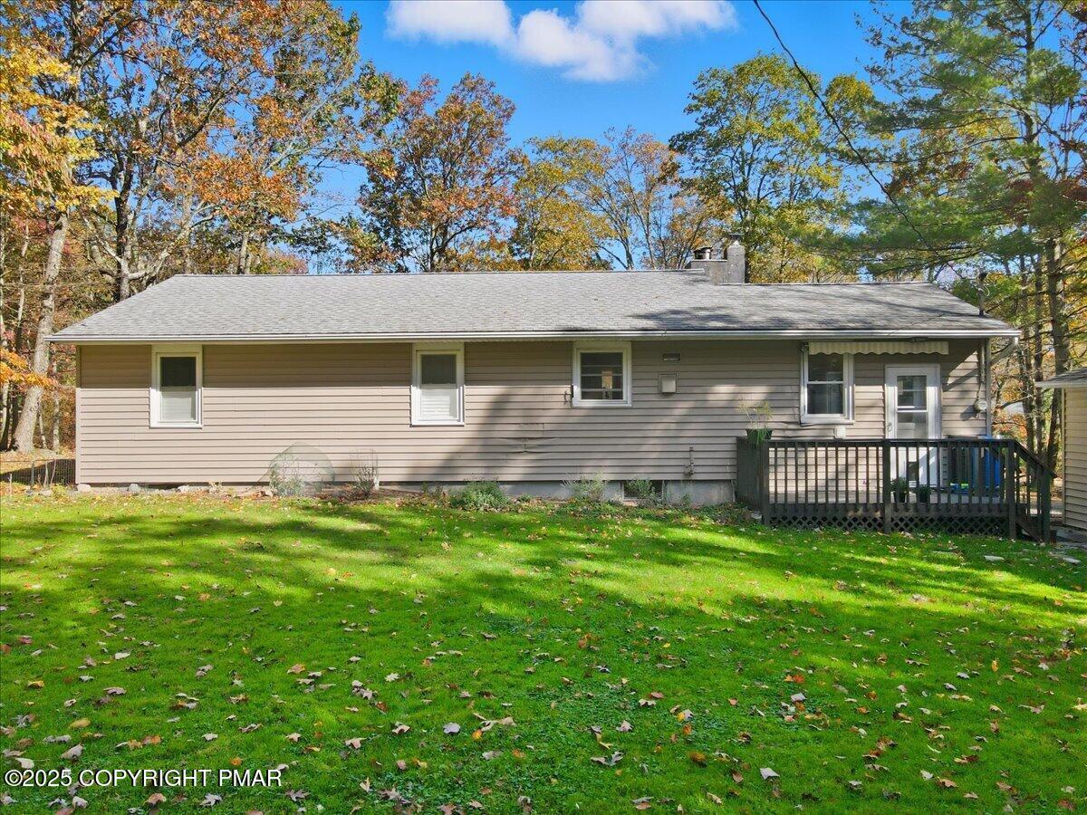 612 Prices Drive Cresco, PA 18326 - Photo 28 of 37 a view of a house with a backyard