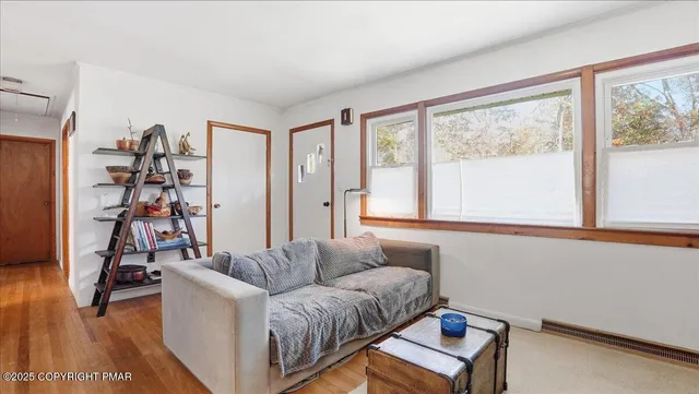 a kitchen with a sink and white cabinets