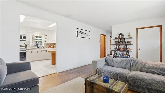 a kitchen with a sink cabinets and window