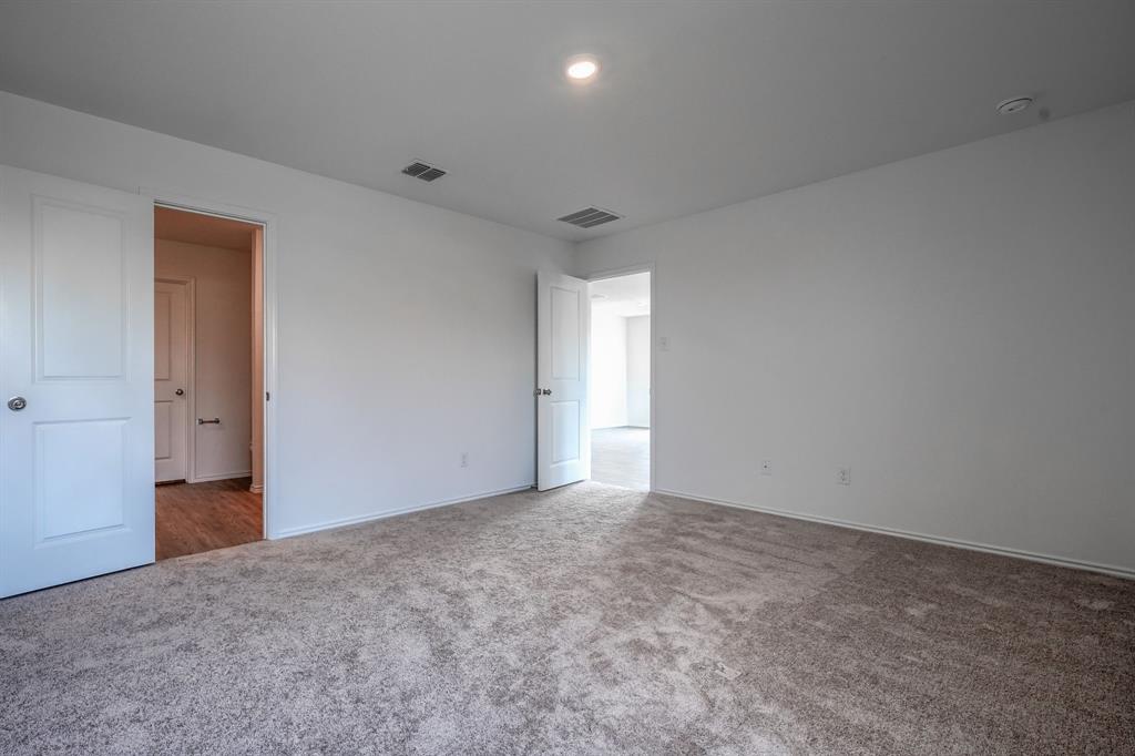 5916 Crystal Water Way Princeton, TX 75407 - Photo 16 of 28 a view of an empty room