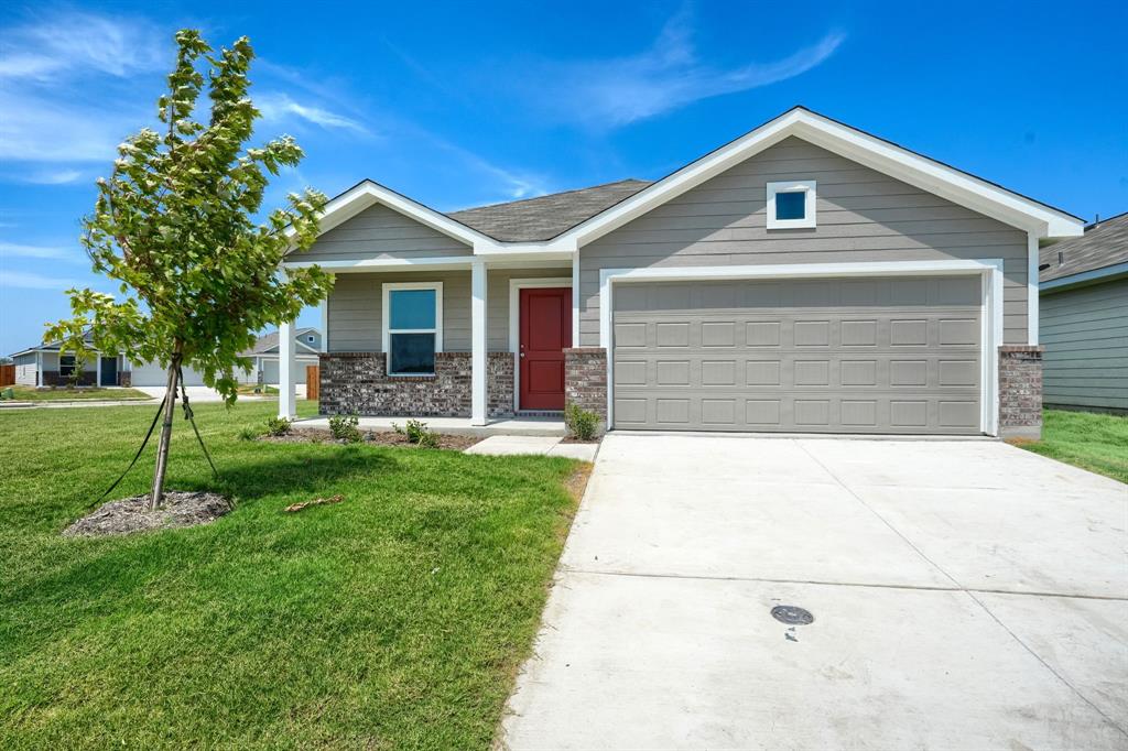 5916 Crystal Water Way Princeton, TX 75407 - Photo 2 of 28 a front view of a house with a yard