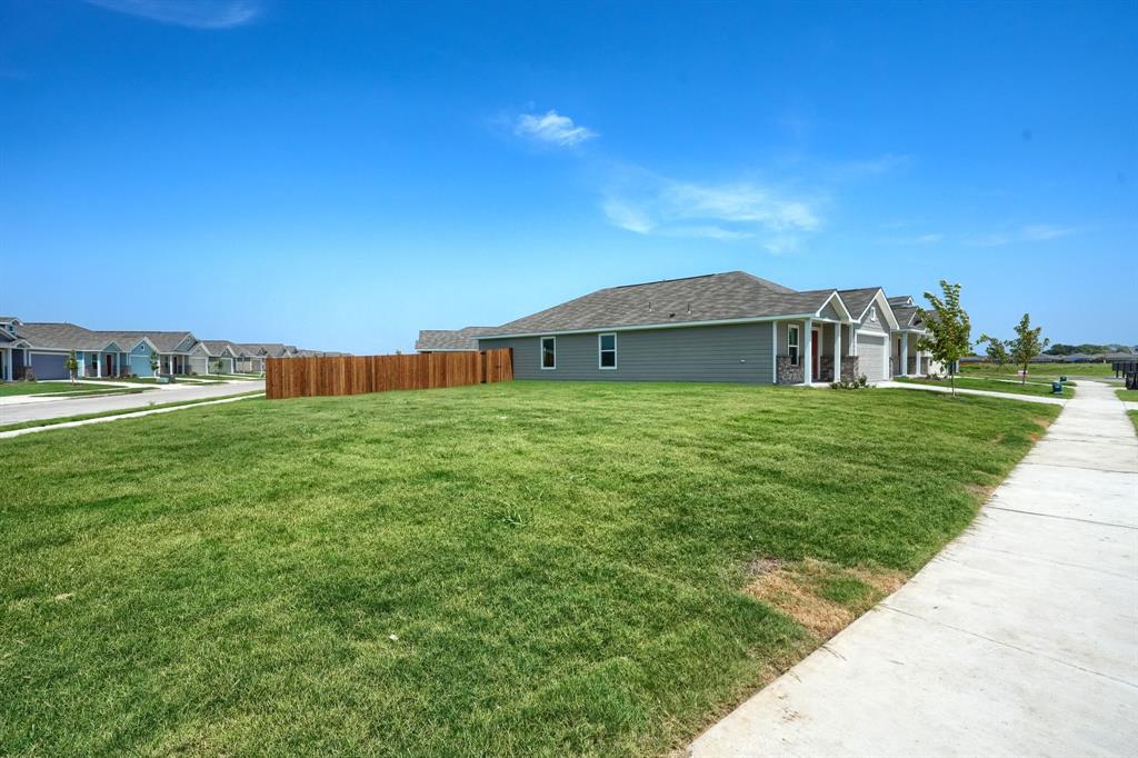 5916 Crystal Water Way Princeton, TX 75407 - Photo 24 of 28 a view of a house with a big yard