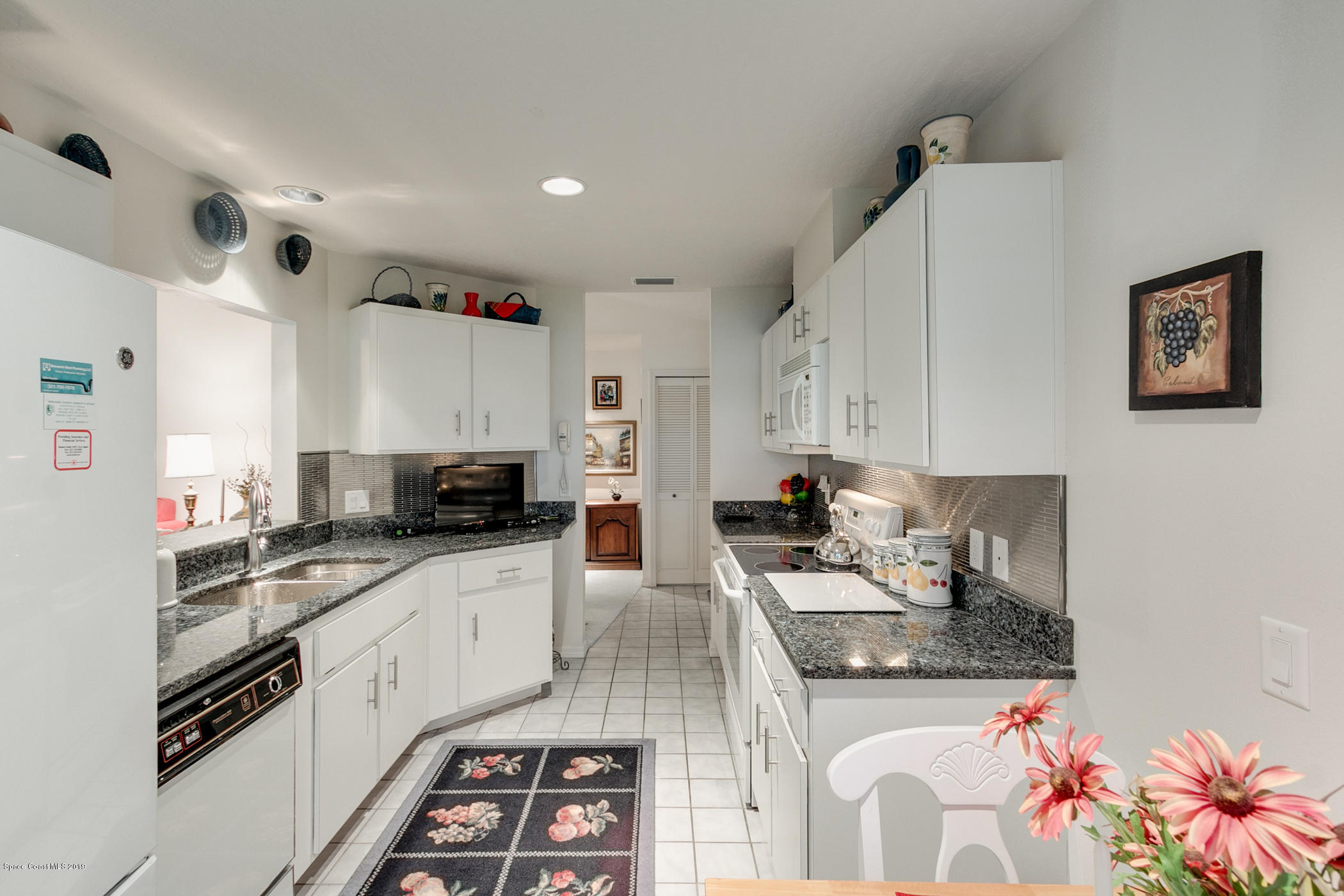 906 Ridge Lake Drive Melbourne, FL 32940 - Photo 13 of 30 kitchen with granite counters