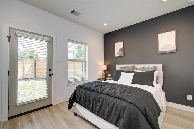 2309 Eagle Street Houston, TX 77004 - Photo 14 of 34 a bedroom with a bed and a window