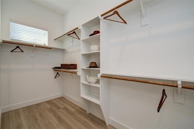 2309 Eagle Street Houston, TX 77004 - Photo 21 of 34 a view of walk in closet with empty racks