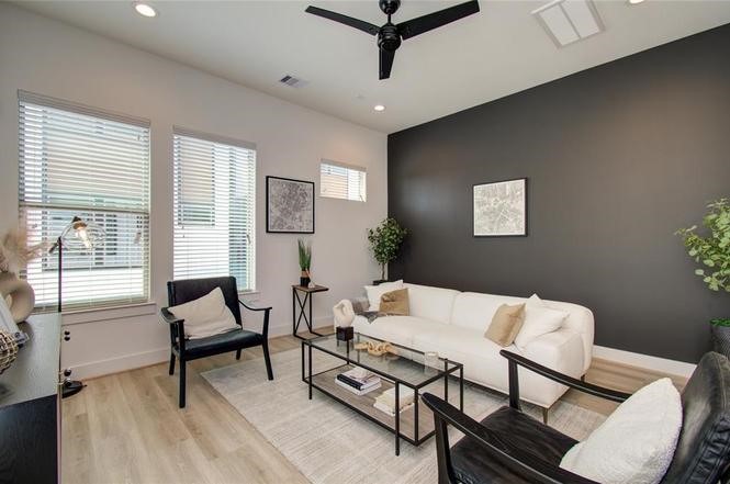 2309 Eagle Street Houston, TX 77004 - Photo 9 of 34 a living room with furniture and a window