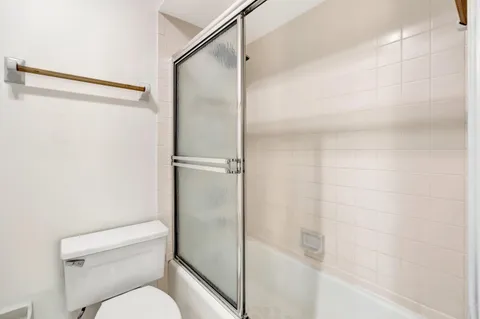 a view of a hallway with closet