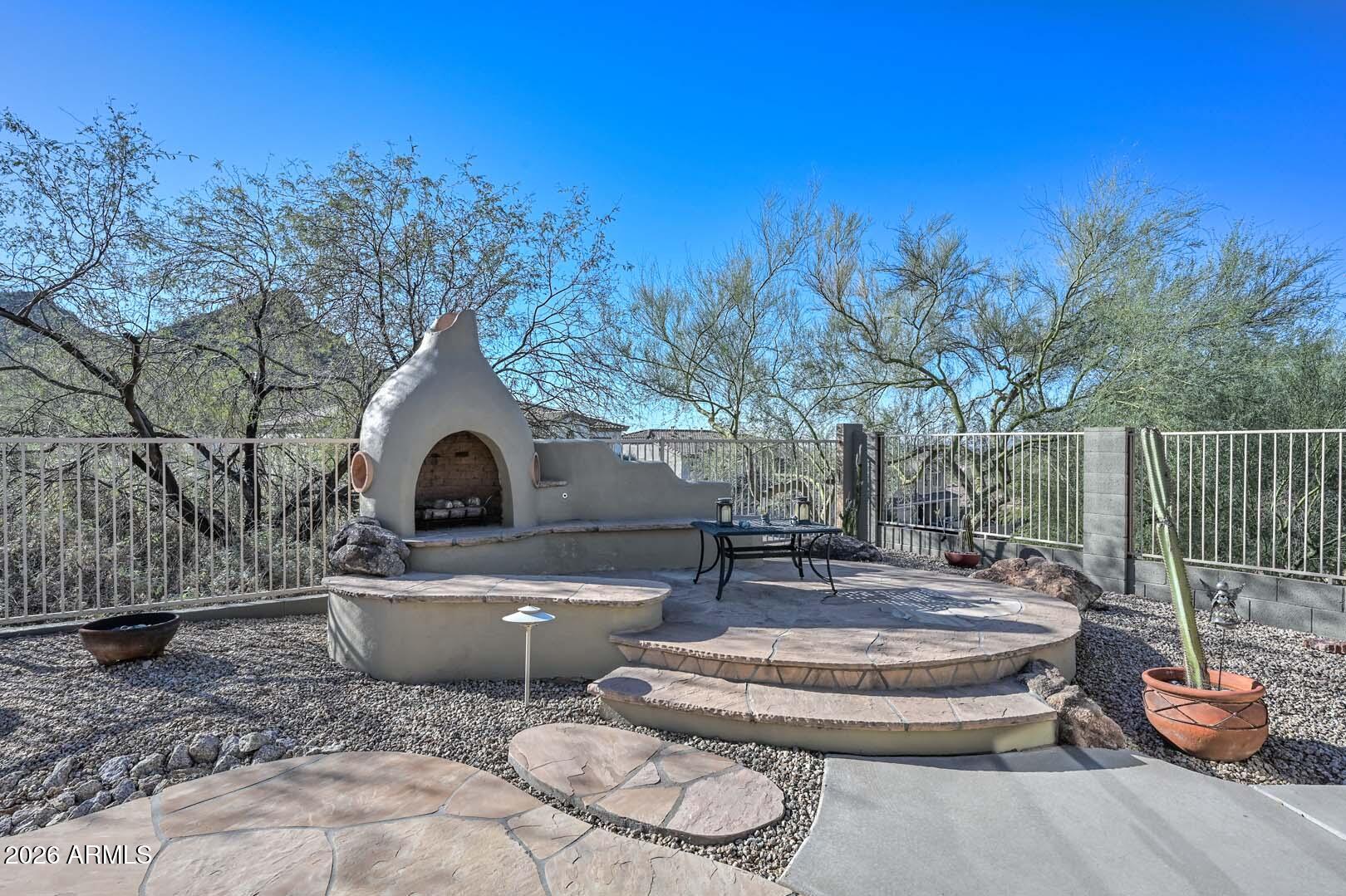 6133 West Fetlock Trail Phoenix, AZ 85083 - Photo 56 of 66 Backyard-Kiva Fireplace