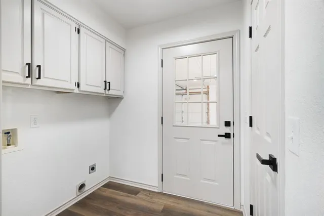 a view of wooden floor and closet