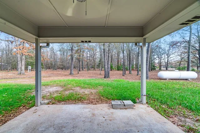 a garden view with a seating space