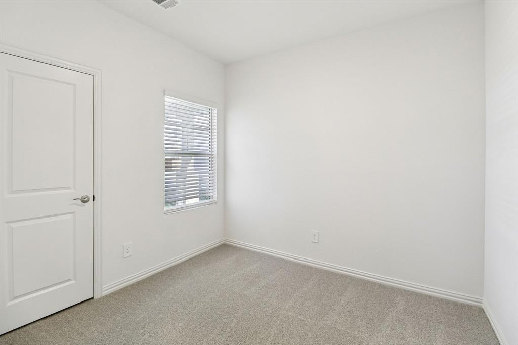 1708 Arches Road Anna, TX 75409 - Photo 9 of 21 a view of an empty room with a window