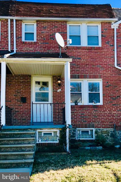 7 Warren Road Baltimore, MD 21221 - Photo 1 of 16 Middle of group for this brick exterior rowhome