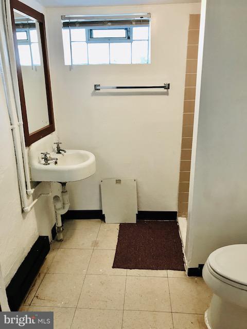 7 Warren Road Baltimore, MD 21221 - Photo 14 of 16 Basement full bathroom with standing shower