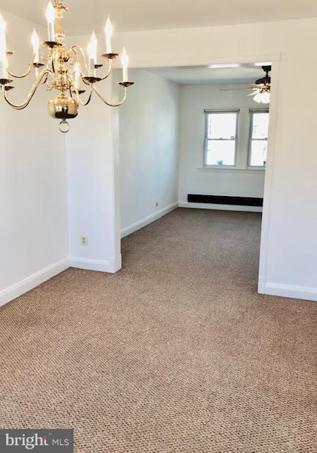 7 Warren Road Baltimore, MD 21221 - Photo 3 of 16 Dining room looking into living room