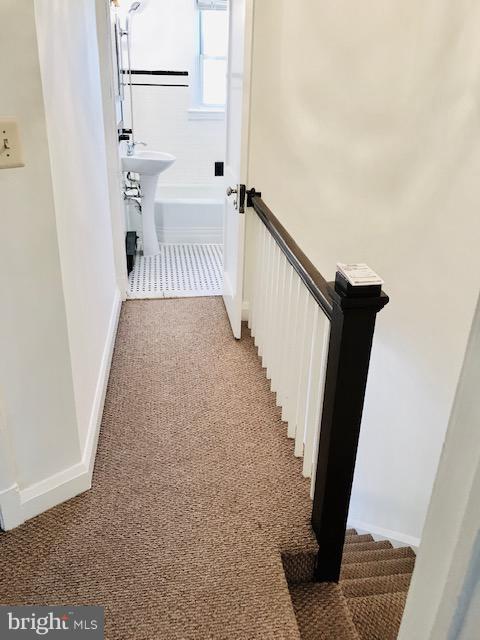7 Warren Road Baltimore, MD 21221 - Photo 8 of 16 Upstairs hallway and stairs with