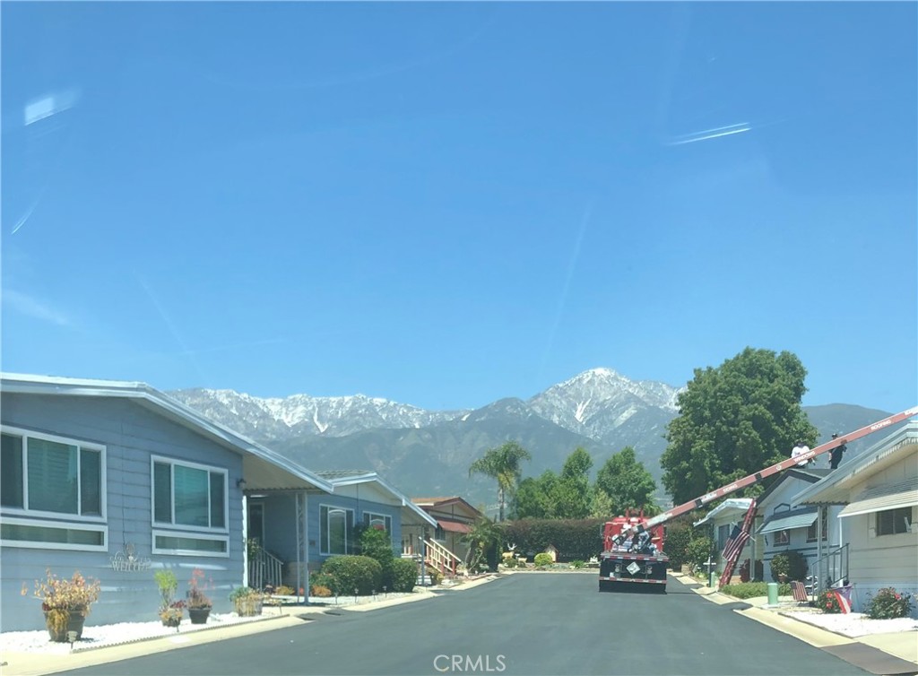10210 Base Line Road Rancho Cucamonga, CA 91701 - Photo 13 of 13 a view of a street in front of a house