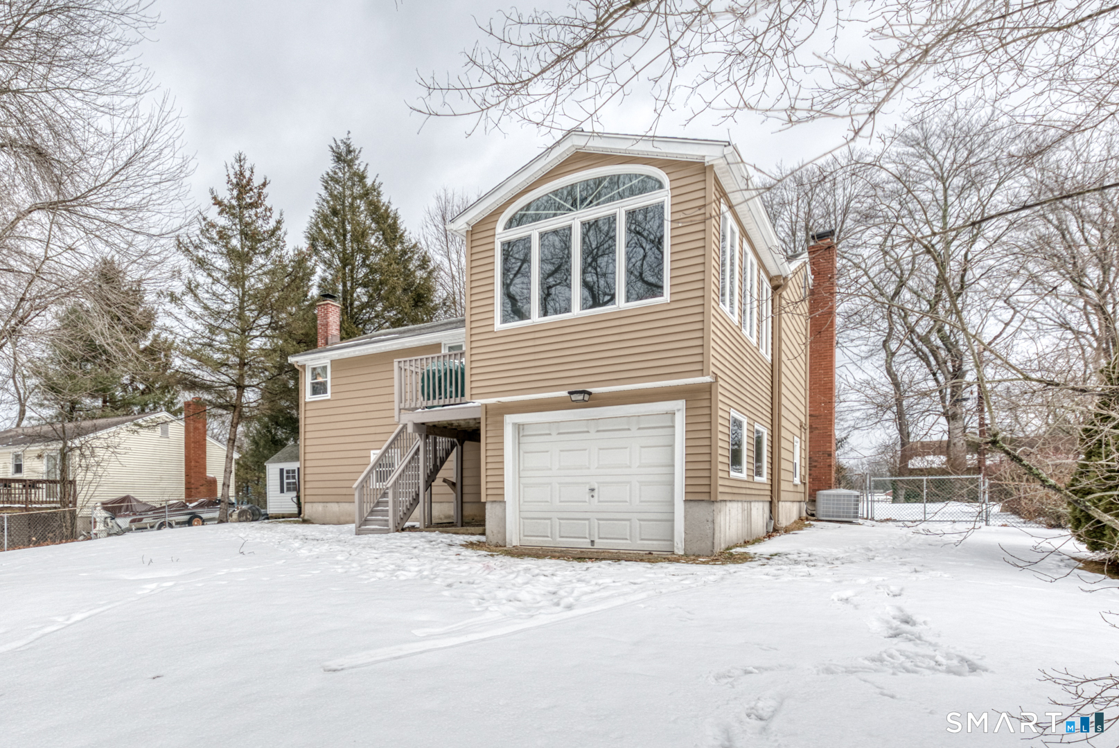 4 Arrow Drive Plymouth, CT 06786 - Photo 5 of 39 Back view with 4 season sunroom and extra storage garage