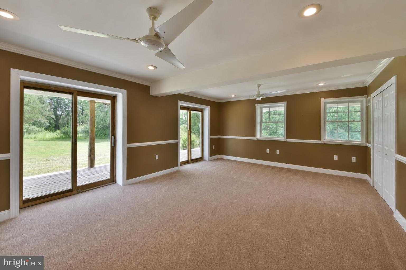 715 Bucks Road Perkasie, PA 18944 - Photo 29 of 55 Family Room with Sliders to Covered Porch