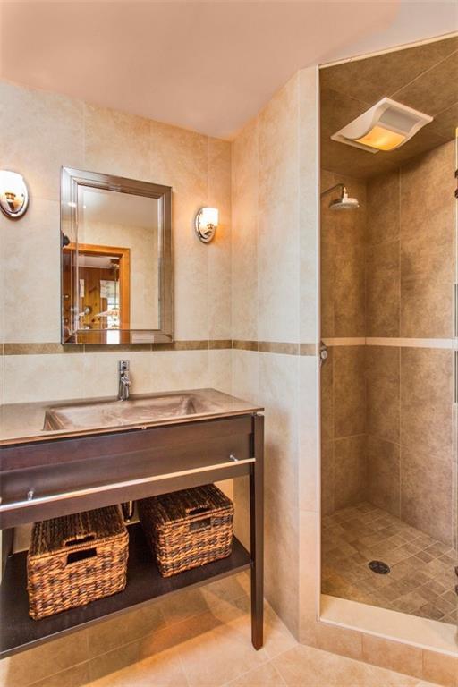 132 Shore Road Boothbay, ME 04544 - Photo 14 of 28 The first floor bathroom, with tile...