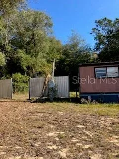 a view of yard covered with snow