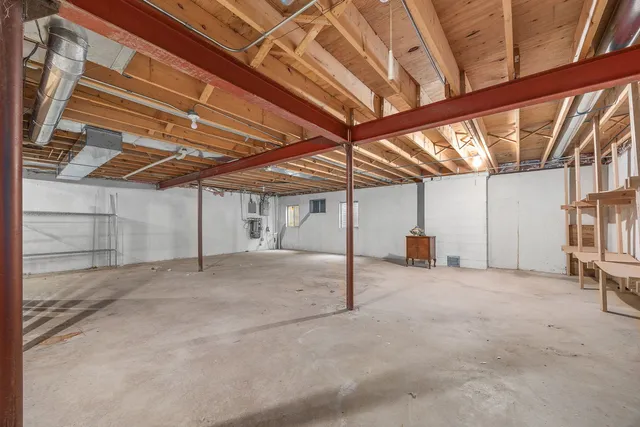 a view of a house with snow on the road