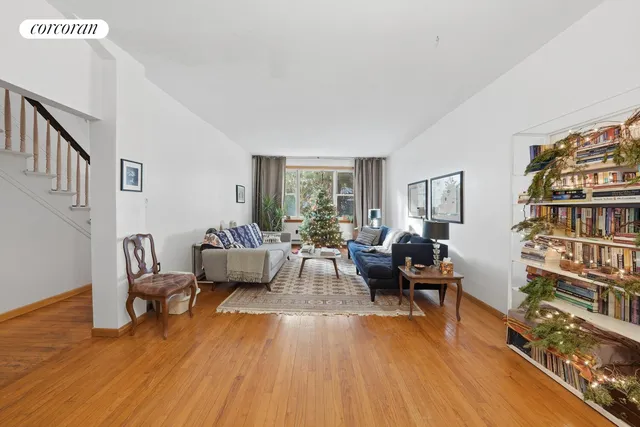 a black and white photo of a living room