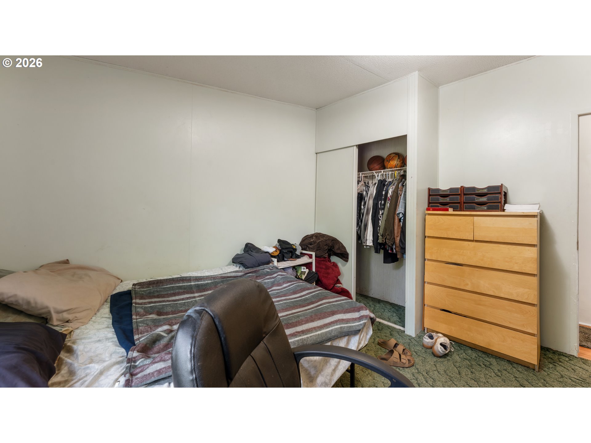 31484 Southeast Woodland Road Estacada, OR 97023 - Photo 20 of 40 a room with a bed and closet