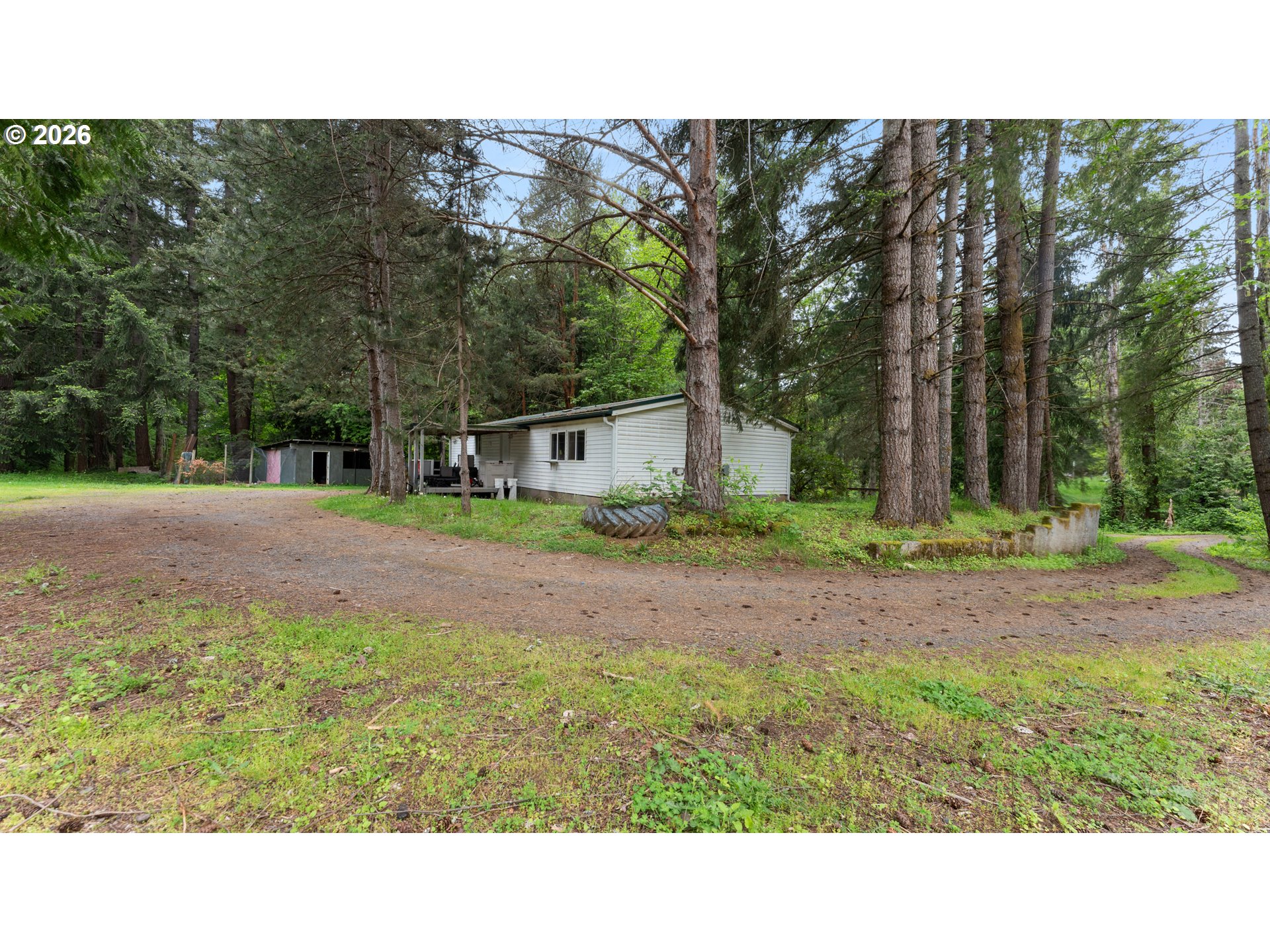 31484 Southeast Woodland Road Estacada, OR 97023 - Photo 3 of 40 a black and white photo of a house