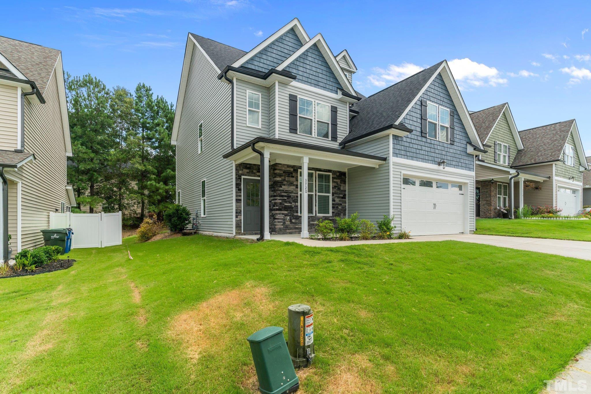 3720 Massey Ridge Court Raleigh, NC 27616 - Photo 3 of 56 a view of a yard in front of house