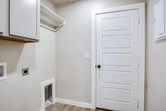 a view of a house with backyard and porch