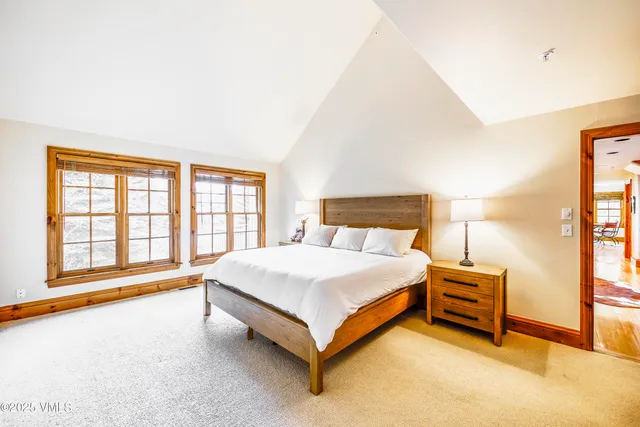 a view of entryway with wooden floor and stairs